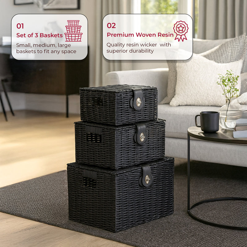 Set of three black woven storage baskets with a living room background