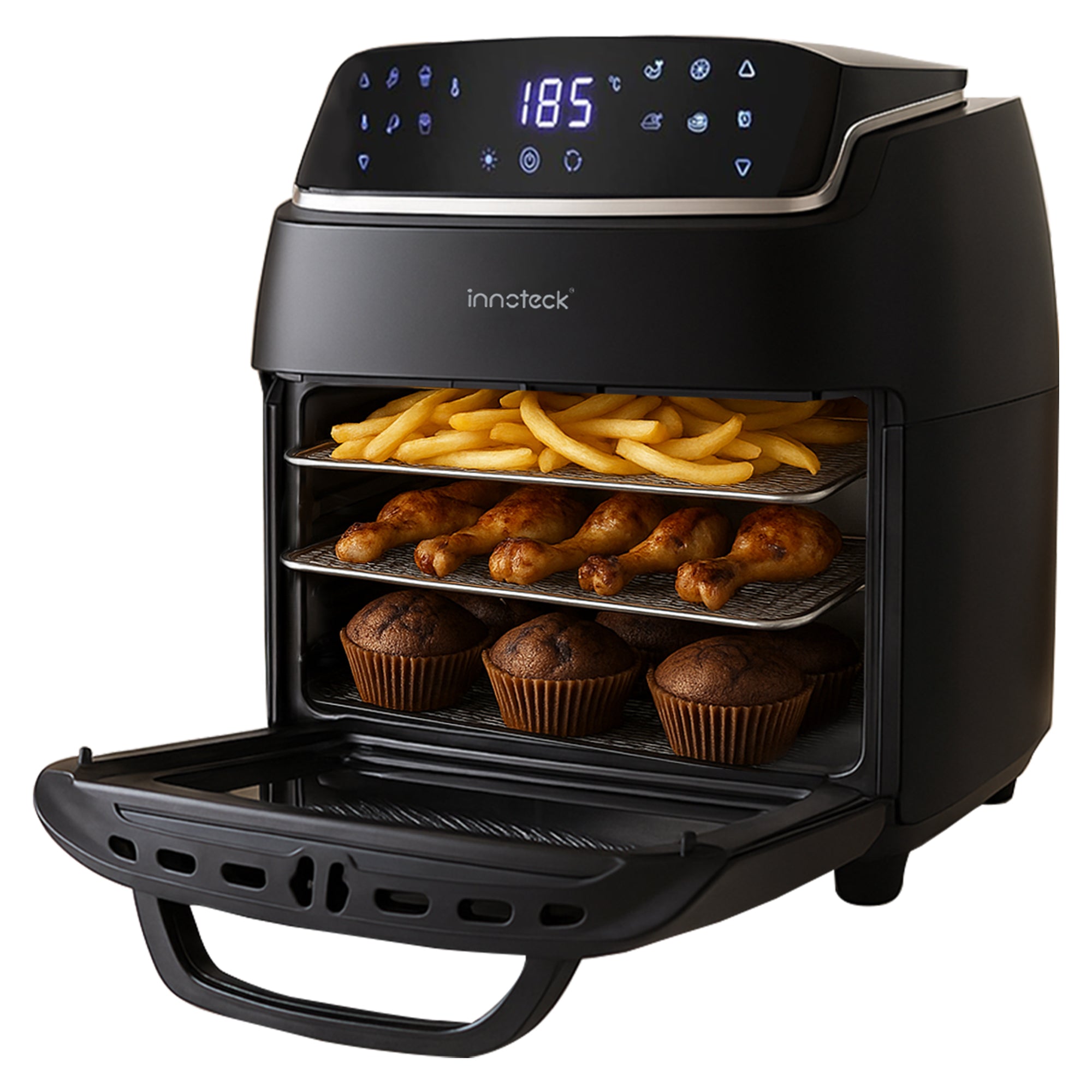 Black air fryer with food items on the racks on a white background