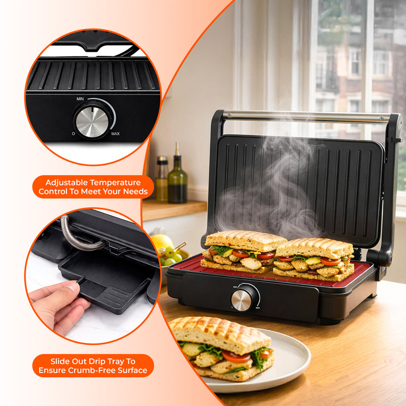 Electric sandwich maker with adjustable temperature control and slide-out drip tray, surrounded by ingredients and a plate of sandwiches.